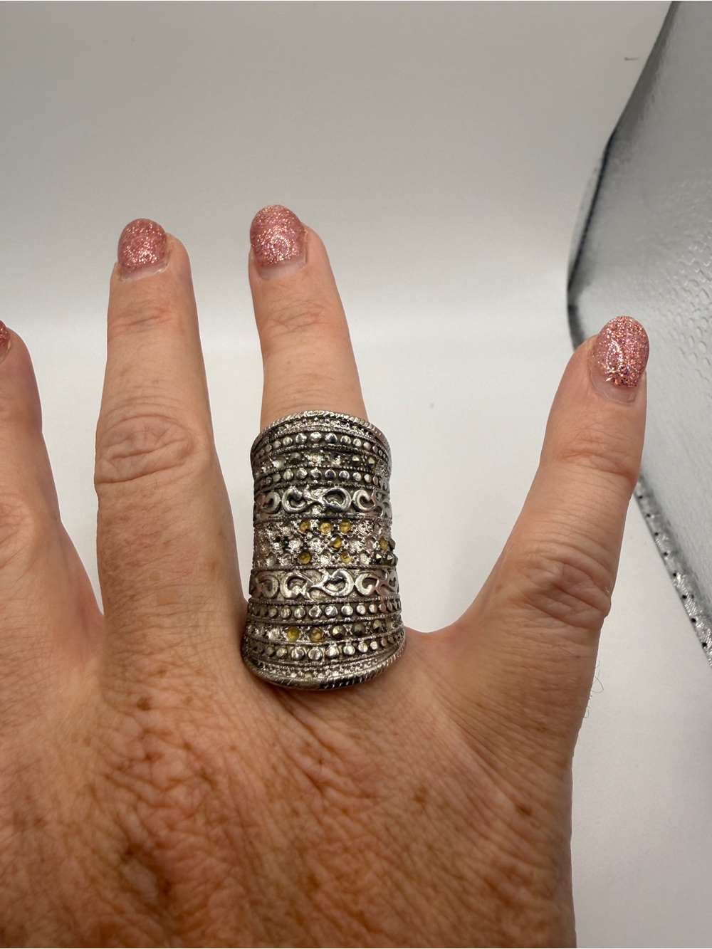Ornate Silver-Tone Filigree Statement Ring with Rhinestone Accents
